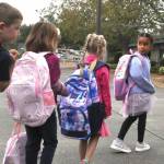 Sequim Gazette photo by Matthew Nash
Natalie Ramirez leads the line of kindergartners in Sarah Wilhelms class who were dropped off for the first day of school on Sept. 2 at Greywolf Elementary School. All other Sequim School District students started the week prior on Aug. 27.