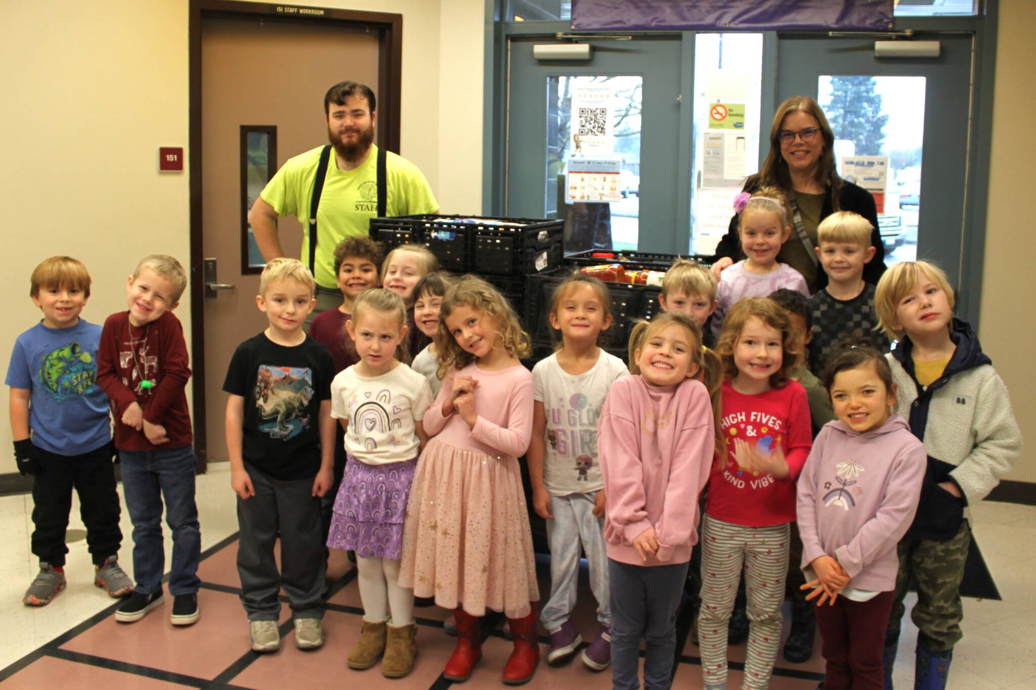 Photo courtesy Sandra Carlson
Sharon Murphys kindergarten class at Greywolf Elementary stands by a donation of items to the Sequim Food Bank during the schools 12 Days of Giving. Murphys class won bonus recess time for collecting the most food each day.
