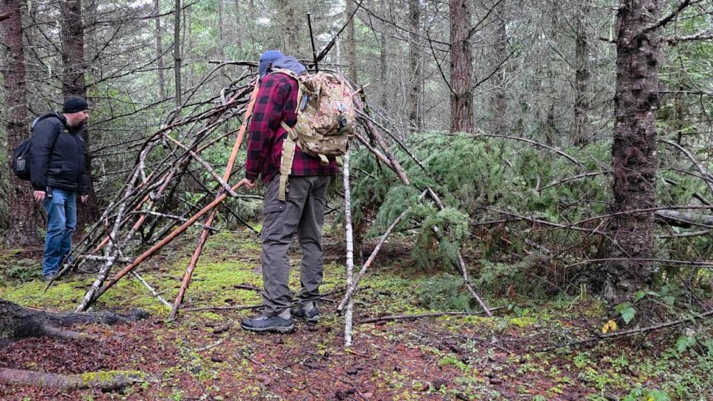 Edgecombe, left, and fellow Sasquatch researcher Matt Parrish of Port Angeles come across a strange structure on Bear Mountain off Palo Alto Road.