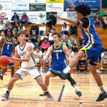 Photo by Emily Mathiessen
Sequims Mason Rapelje looks for a teammate as Bremerton players begin to swarm him on Jan. 14. The Wolves lost to the defending state champions 79-56 but rebounded with two more wins last week.