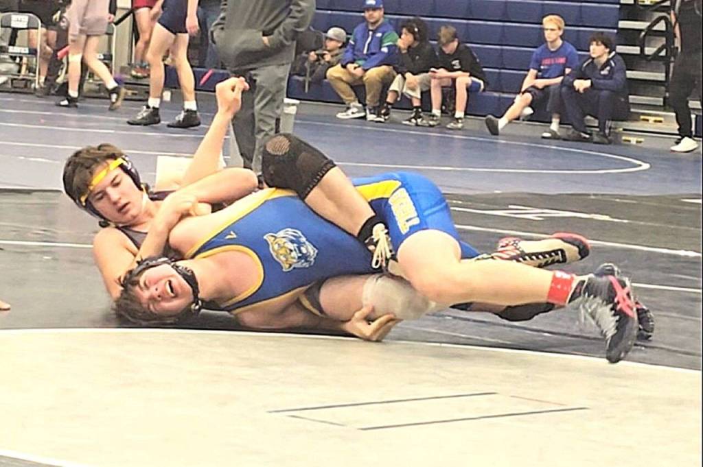 Photo by Marcie Lammers
Aiden Glenn of Sequim earns a pin in 1:40 over Jaxson Smith of Stadium in the first round of the River Ridge Rumble on Jan. 17 in Lacey. He earned fourth in the tournaments 175-pound bracket.