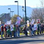 Sequim Gazette photo by Monica Berkseth/
Peaceful protesters gather along Washington Street on Jan. 19 (Martin Luther King Jr. Day) during an event organized by Indivisible Sequim.