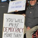 Roger Slagle of Sequim participates with Ingrid Carmean at a peaceful protest. Slagle said hes been at several protests in Sequim and he was there opposed to the shooting of Pretti. He said its important to participate and be counted, as it gives people hope. If people dont stand up and say something, everyone gets despondent, he said.