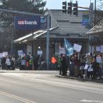 Sequim Gazette photo by Matthew Nash/
Locals hold signs up at the corners of Washington Street and Sequim Avenue during a peaceful protest on Jan. 25.