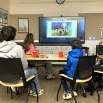 Five current Sequim students watch a presentation from Shiso City students about their areas events, culture, and geography on Jan. 24 in Sequim. Local students will tentatively go to Shiso City, Japan in 2027 and their students will come to Sequim in 2028.