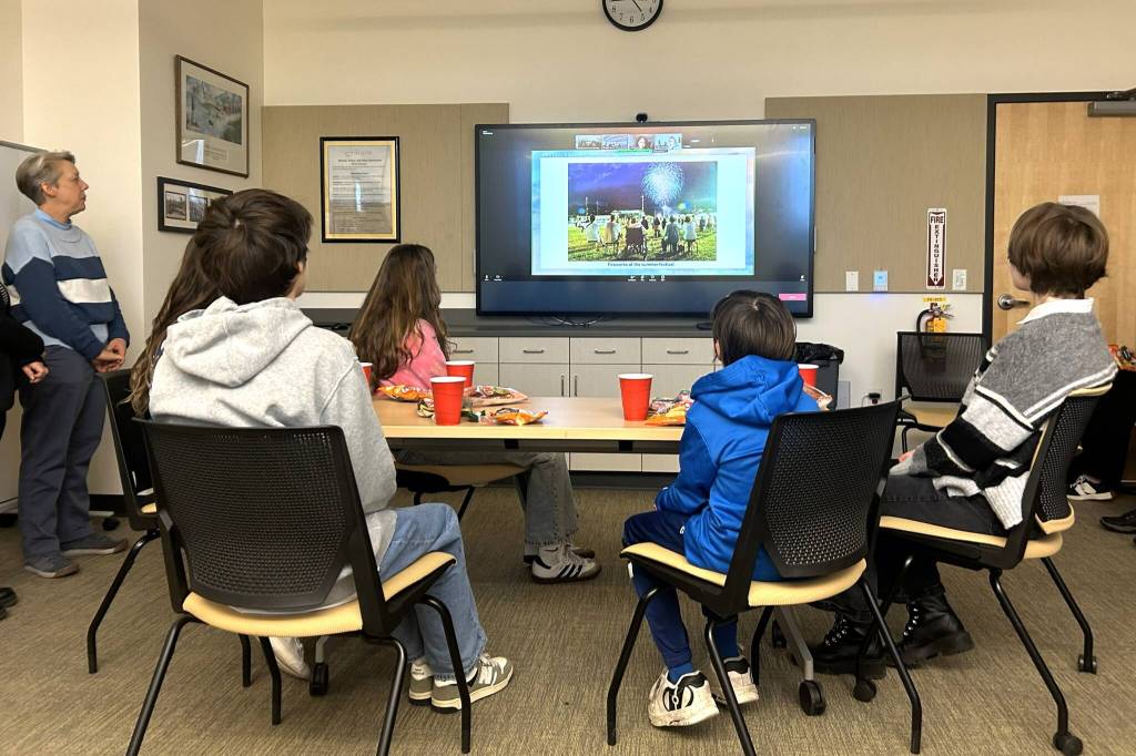 Five current Sequim students watch a presentation from Shiso City students about their areas events, culture, and geography on Jan. 24 in Sequim. Local students will tentatively go to Shiso City, Japan in 2027 and their students will come to Sequim in 2028.