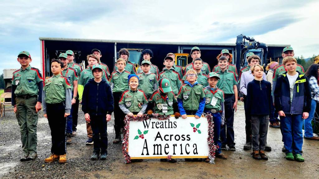 Youth organizations Trail Life USA and Heritage Girls assisted in the annual wreath and flag retirement ceremony.