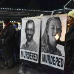 Sequim Gazette photo by Monica Berkseth/ Large photos of Minneapolis residents Alex Pretti and Renee Good were displayed during the Jan. 27 candlelight vigil held in Sequim to protest their killings by federal agents.