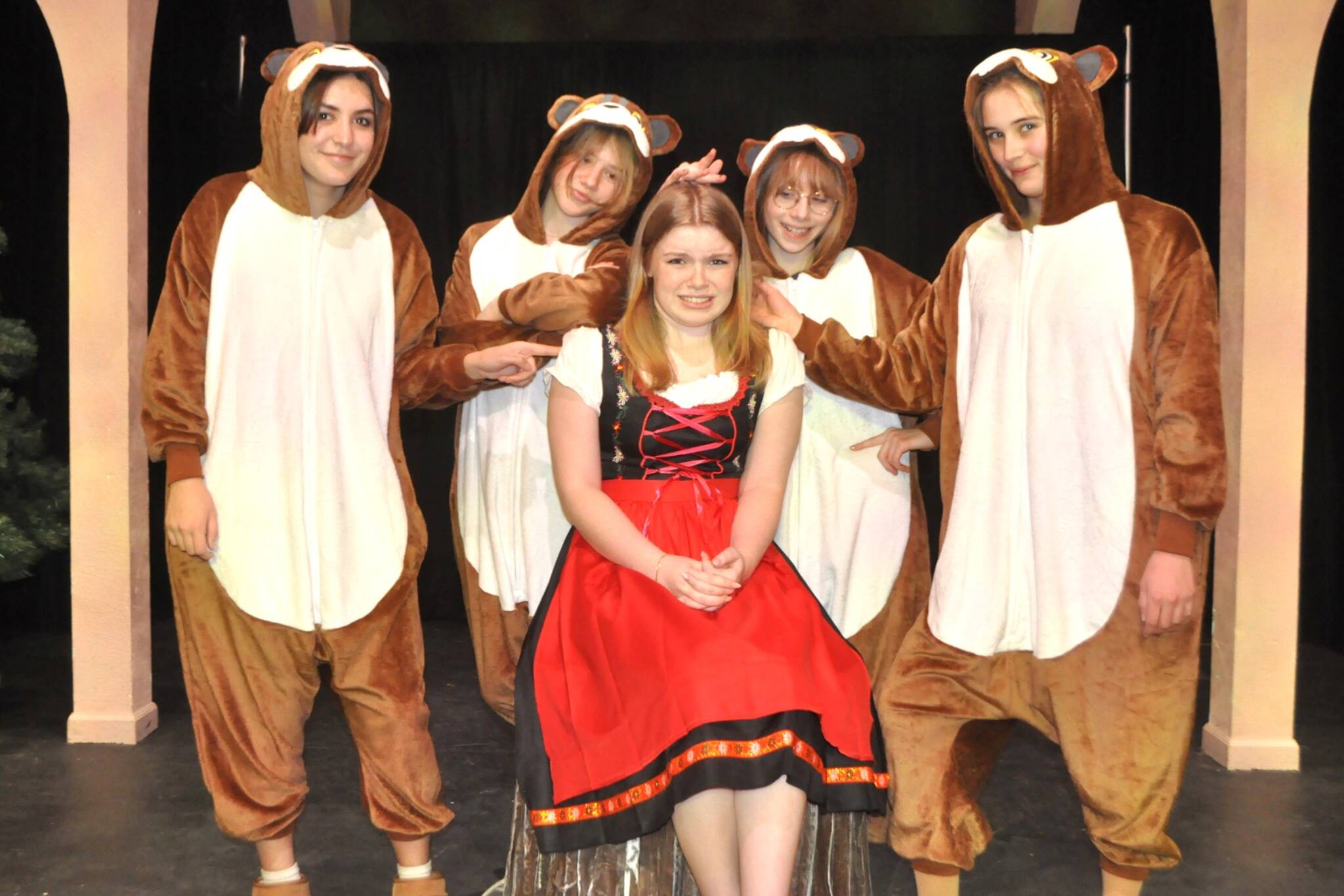 Sequim Gazette photo by Matthew Nash
Bernie Riding-Hood (Trinity Myers) encounters a group of annoying squirrels, played by Amara Buggy, Gretel Maberry, Rain Nelson, and Sasha Larson in Its Not About the Hood: Bernies Tale.