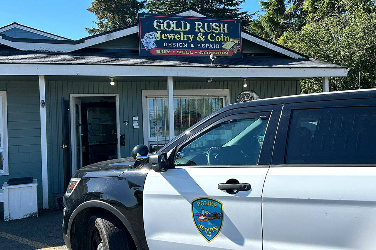 Sequim Gazette file photo by Matthew Nash/
Sequim Police Department and the Olympic Peninsula Narcotics Enforcement Team (OPNET) serve a search warrant at Gold Rush Jewelry on Aug. 29, 2024 after months of investigating customer complaints. Its owner Kurt Miller tentatively faces 40 counts of theft and/or writing bad checks while his employee Kimberly Stober faces 12 similar charges. She pleaded not guilty on Jan. 30.