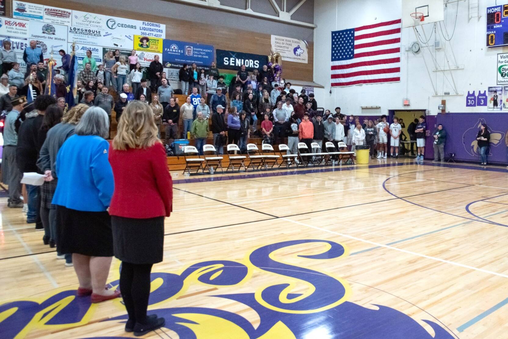 Photos by Emily Matthiessen
A new flag courtesy of the Michael Trebert Chapter of the Daughters of the American Revolution is now hanging in Sequim High Schools Rick Kaps Gymnasium.