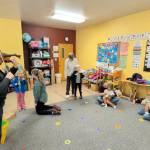Photo courtesy Sequim Community Orchestra/ Sprouts students practice the E string song together.