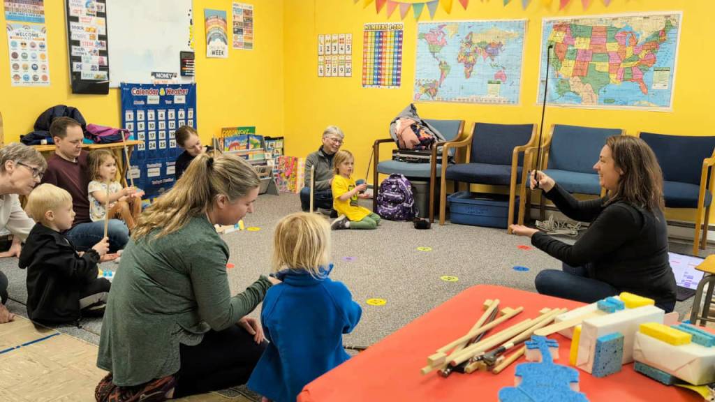 Photo courtesy Sequim Community Orchestra/ Sprouts students try their hand at bow bounces.