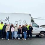 Photo courtesy Sequim Food Bank 
Outgoing Sequim Food Bank Executive Director Andra Smith, third from left, stands with the food bank team, including her successor, Jen Colmore, fourth from left. Others include, from left, Josh Forberg, David Mendoza, Virginia Reitsam, Wren Fierro-Burdick, June Nicholas, Ashley Reddicks, Emily Callahan, Cole Tierney, and Mark Gebbia.