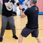 Photo courtesy Olympic Peninsula YMCA
Boxing student Douglas M. Rudd, left, practices boxing skills with coach and Rock Steady boxing instructor Bill Caples.