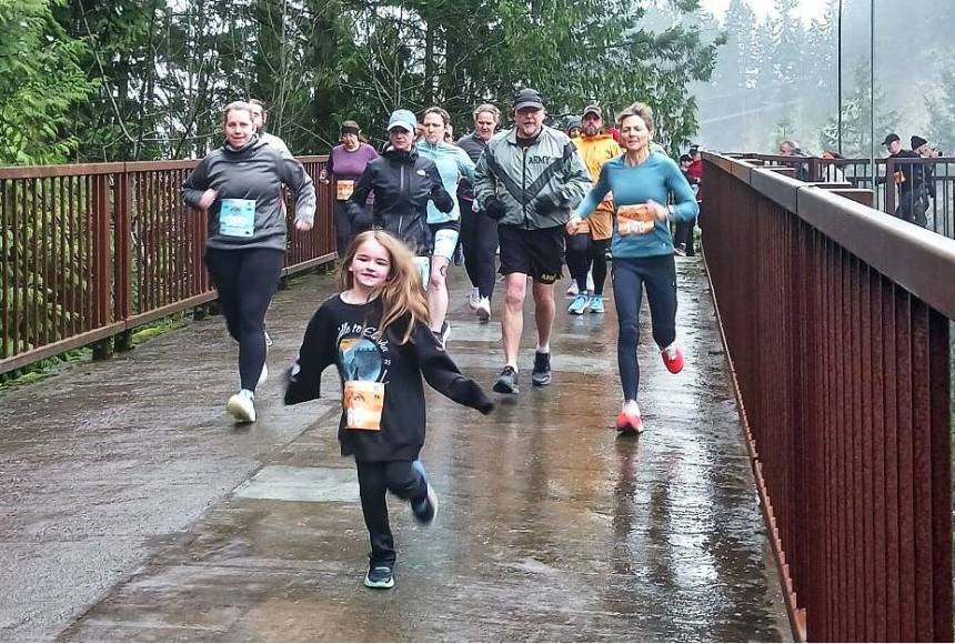 <p>Olympic Peninsula News Group photo by Pierre LaBossiere/</p>
                                <p>Runners in the Run The Peninsula&rsquo;s Elwha Bridge Run take off into the rain Saturday morning.</p>