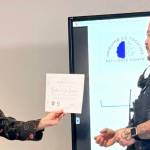 Photo courtesy Clallam Resilience Project 
Lieutenant Jim Thompson of the Lower Elwha Police Department accepts his Certificate of Recognition.