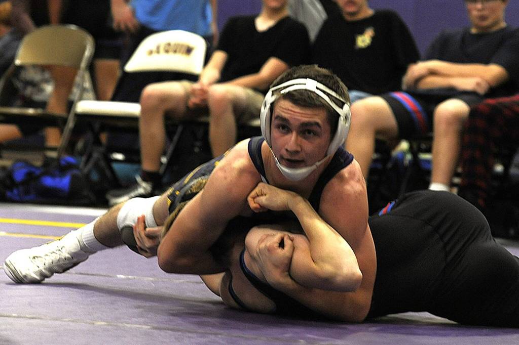 Sequim Gazette file photo by Matthew Nash
Riley Downs, pictured in a Sequim head-to-head meet earlier this season, will compete at the Mat Classic state 2A meet in the 144-pound bracket.