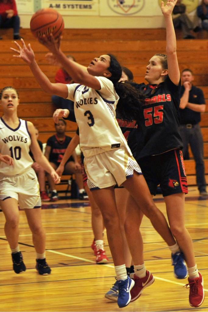 Sequim Gazette photo by Matthew Nash/ Sequims Jordyn Julmist goes up for a lay-in. She had 11 points and 15 rebounds against Orting.