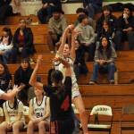 Sequim Gazette photo by Matthew Nash/ Sequims Kaiya Robinson goes up and sinks one of her three 3-pointers against Orting.