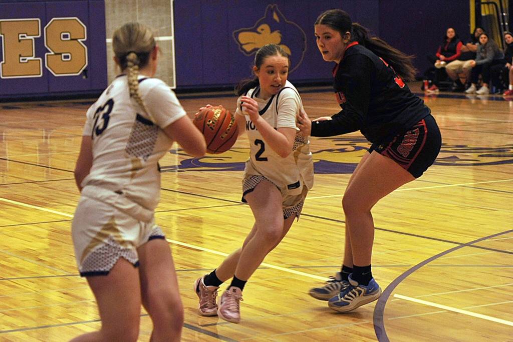 Sequim Gazette photo by Matthew Nash/ Sophia Rhynes looks for room to drive in the fourth quarter against Orting.