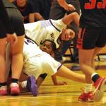 Sequim Gazette photo by Matthew Nash/ Sequims Jordyn Julmist and teammates go for a jump ball against Orting in the district playoff game. Sequim won 74-55 and they advanced to the state tournament after beating Bainbridge the next day.