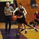 Sequim Gazette photo by Matthew Nash/ Sequims Gracie Chartraw attempts to ricochet the ball off an Orting player on Feb. 20.