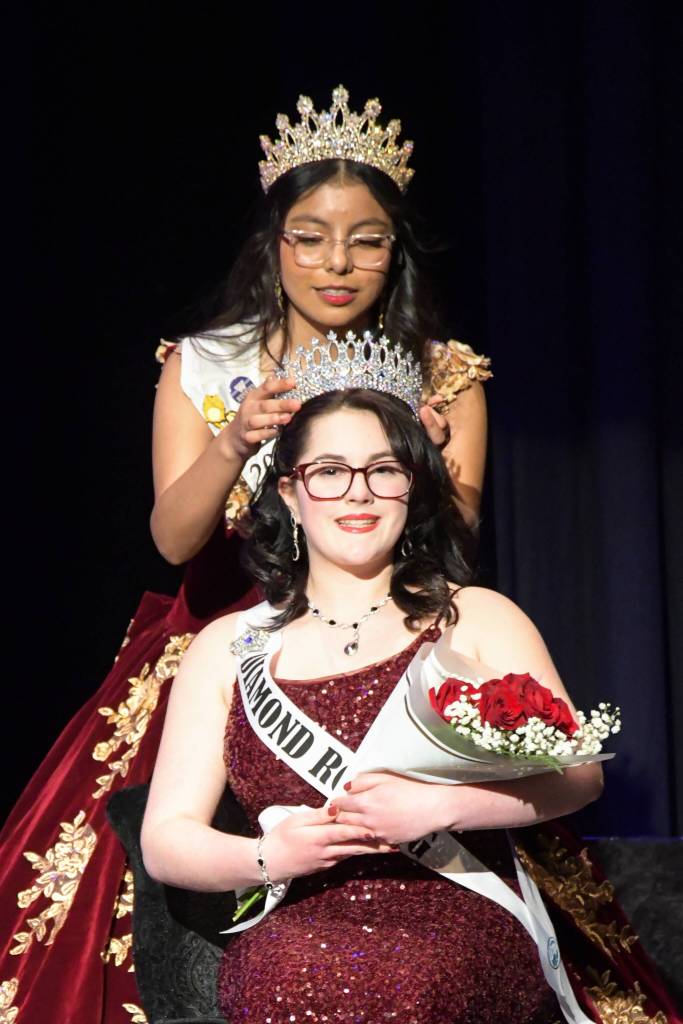 Sequim Gazette photo by Monica Berkseth/
Princess Joanna Morales crowns new 2026 Princess Emma Rhodes during the Royalty Ambassador Scholarship Pageant.