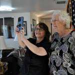 Sequim Gazette file photo by Matthew Nash/
Cheri Tinker, executive director of Sarges Veteran Support, takes a photo with Helen Starr, executor of James Minskys estate which helped pay LtCol James Minsky Place for disabled and/or elderly veterans in Sequim. She announced this month shell be moving to Oregon to be with family, and Sarges will close its thrift store The Attic in Forks due to declining revenues, but its other operations will continue.