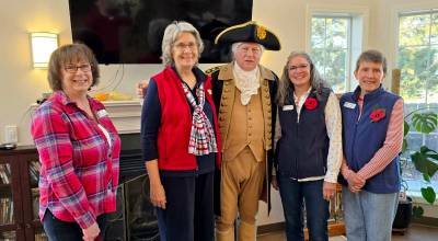 Photo courtesy New Dungeness Chapter, NSDAR 
Vern Frykholm (center) as George Washington will partner with the ladies of the New Dungeness Chapter, NSDAR for a Trivia Night fundraiser benefiting the New Dungeness Lighthouse on Saturday, March 28. Questions will center on the American Revolution and Olympic Peninsula history as the country counts down to Americas 250th birthday celebration. Shown with Frykholm are, from left, chapter Regent Anita Reynolds and officers Marianne Burton, Mona Kinder, and Carol Medlicott, members of the event committee.