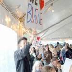 Sequim Gazette photo by Monica Berkseth/ Anderson Williams and others cheered on Sunshine Festival talent competition performer Blaine Griffin.