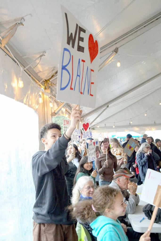 Sequim Gazette photo by Monica Berkseth/ Anderson Williams and others cheered on Sunshine Festival talent competition performer Blaine Griffin.