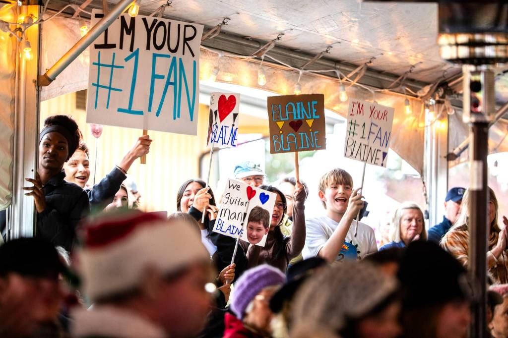 Photo courtesy Silas Crews, City of Sequim/ Family and friends cheer for Blaine Griffin at the Shine On, Sequim! talent competition.