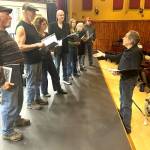 Director/writer Steve Fisher, right, talks to actors about his Next Stage to Bellevue to be read aloud at Olympic Theatre Arts Readers Theatre program March 20-22. Actors, from left, include Joe Shulz, Ken Burland, Mary Daniel, Bill Stone, Rebecca Maberry, Tara Dupont, and August Maberry.