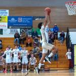 Photo by Emily Matthiessen/
Sequims Solomon Sheppard goes up for a dunk in a home game against North Mason on Dec. 19. Sheppard was named to the Olympic All-League First Team.&nbsp;