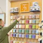 Sequim Gazette photo by Monica Berkseth/ New owner Lacy Thompson, who first bought a candle from Full Moon Candle Co. when she was a teenager, stocks candle melts.