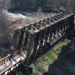 Photo by Michael Dashiell, Jamestown SKlallam Tribe/ Engineers with Fickett Structural Solutions inspect the Dungeness Railroad Bridge in late February and determined the bridge is safe for use while limiting heavy loads on the bridge. Tribal staff said a capital campaign has started to replace the bridges deteriorating truss.