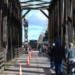 Photo by Michael Dashiell, Jamestown SKlallam Tribe/ Engineers with Fickett Structural Solutions inspect the Dungeness Railroad Bridge in late February and determined the bridge is safe for use while limiting heavy loads on the bridge. Tribal staff said a capital campaign has started to replace the bridges deteriorating truss.