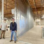 Photos courtesy Shipley Center
Duane Cobb and Dave Conrad stand at the corner of the new gym walls that are 20 feet tall inside the former JCPenney building that is being renovated to become the new Shipley Center.