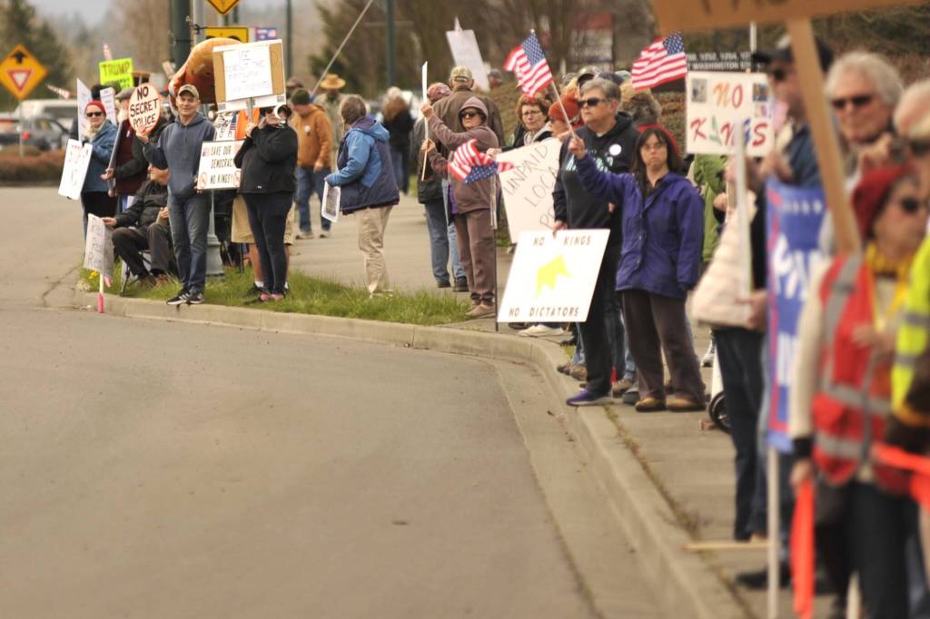 Sequim Gazette photo by Matthew Nash/
Participants in the No Kings 3 rally stretched from the River Road roundabout to the Ninth Avenue roundabout on both sides of West Washington Street.