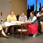 Photo courtesy Mark Klinke
Friends, from left, Christine Palka, Michael Hochstatter, Daniel Brown, Amy Henry, and Mario Arruda play a game of poker in The Odd Couple.