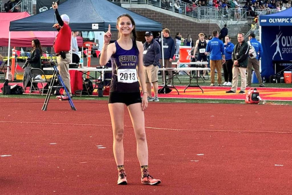 Photo courtesy Kirsti Turella/
Clare Turella celebrates moments after realizing she had won the Washington 2A high jump girls title.
