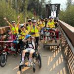 Photo courtesy Ron Baumgardner 
Sequim Wheelers volunteers provide Salish Coast Elementary School students from Port Townsend rides along the Olympic Discovery Trail last September. The nonprofit inclusive bike riding group offers rides again from May-October, depending on weather. An open house is set for 11 a.m.-2 p.m. Saturday, April 11 at the Dungeness River Nature Center.
