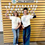 Leader Customer Service rep Coeann Church, left, and Customer Service manager Chandra Halvorsen demonstrate the strength of communities when neighbors support each other.