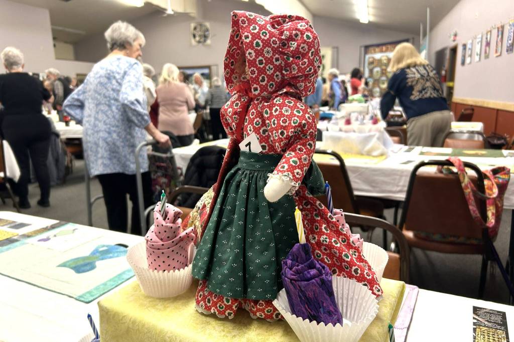 Sequim Gazette photo by Matthew Nash/
Sequim Gazette photo by Matthew Nash/ Centerpieces featured small sunbonnet Sues and/or small sewing machines for the Sunbonnet Sue Quilt Clubs 40th anniversary party.