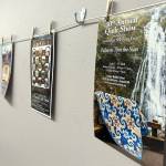 Sequim Gazette photo by Matthew Nash/
Posters from the Sunbonnet Sue Quilt Clubs annual quilt shows were placed on the wall of the Sequim Masonic Lodge during the clubs 40th anniversary.