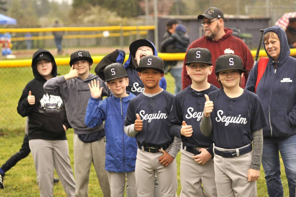 Brothers Plumbing minors baseball players stand together awaiting the start of the Player Parade that officially kicks off the start of Sequim Little Leagues regular season.