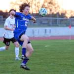 Photos by Emily Matthiessen 
Sequims Max Stanford looks to advance the ball on April 16 against Kingston. Sequim won 5-0.