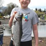 Colton Parker, 13, of Sequim holds up his second catch of the day at Kids Fishing Day. He comes every year, he said.