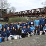 Sequim Gazette photos by Matthew Nash
Sequim High School Interact Club members and a representative with the Sequim Sunrise Rotary gather for a photo after filling buckets and containers for the annual Walk for Water event. Students walked about four miles on April 18 as part of a fundraiser to build a well in Ghana.